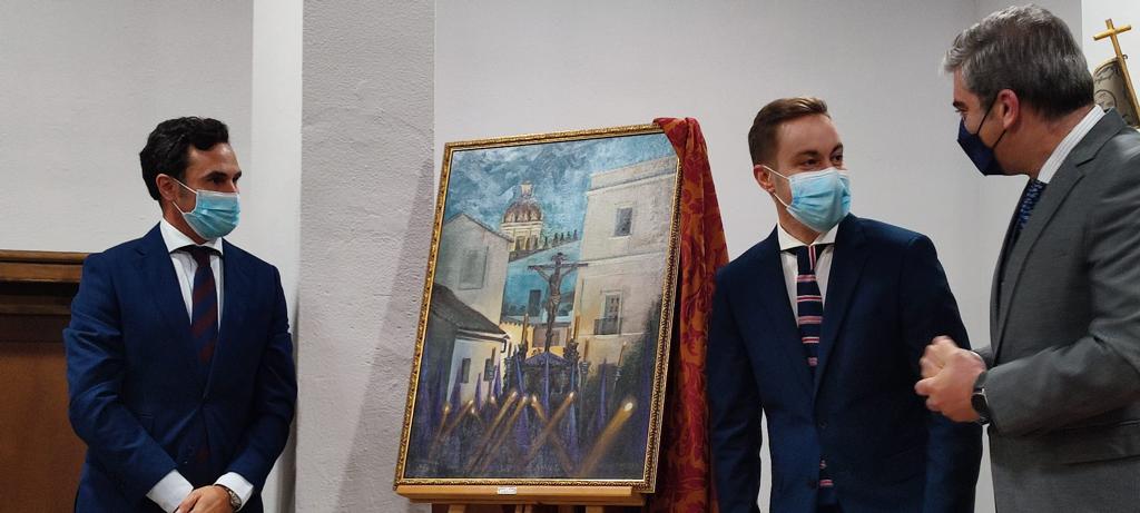 Presentación del cartel con el presidente de la tertulia, el autor y el hermano mayor de La Defensión.