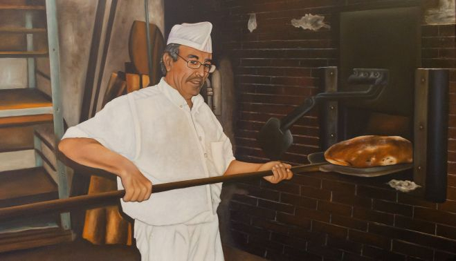 Un cuadro de Victoriano, padre de Israel, trabajando en la panadería de El Portal
