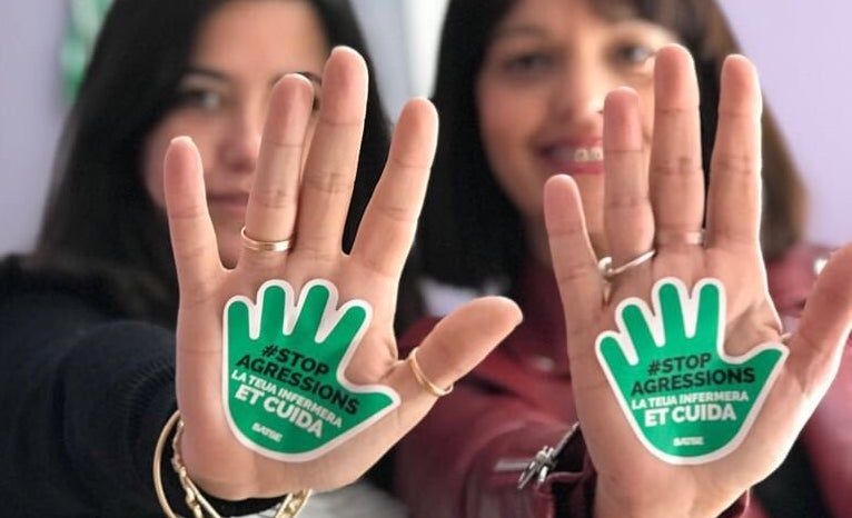Enfermeras en una campaña contra las agresiones.