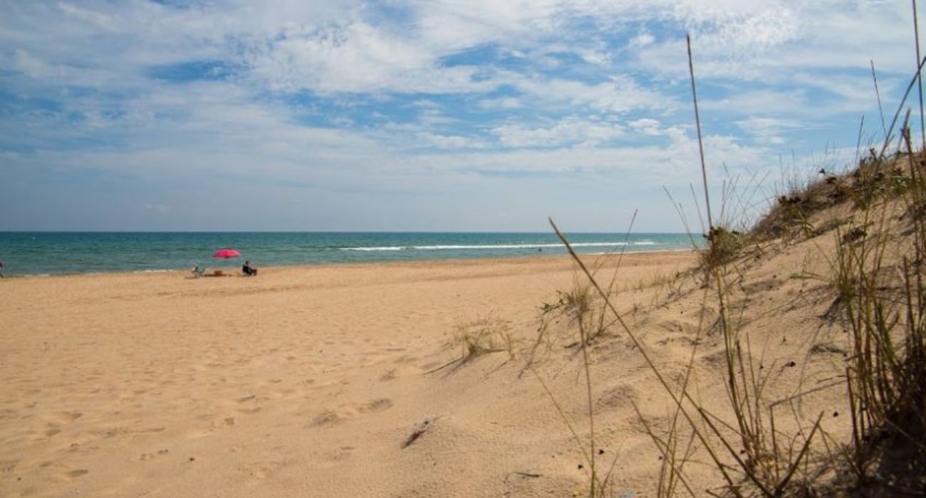 La playa nudista de Cullera donde tuvo lugar el presunto abuso sexual y acoso a una mujer.