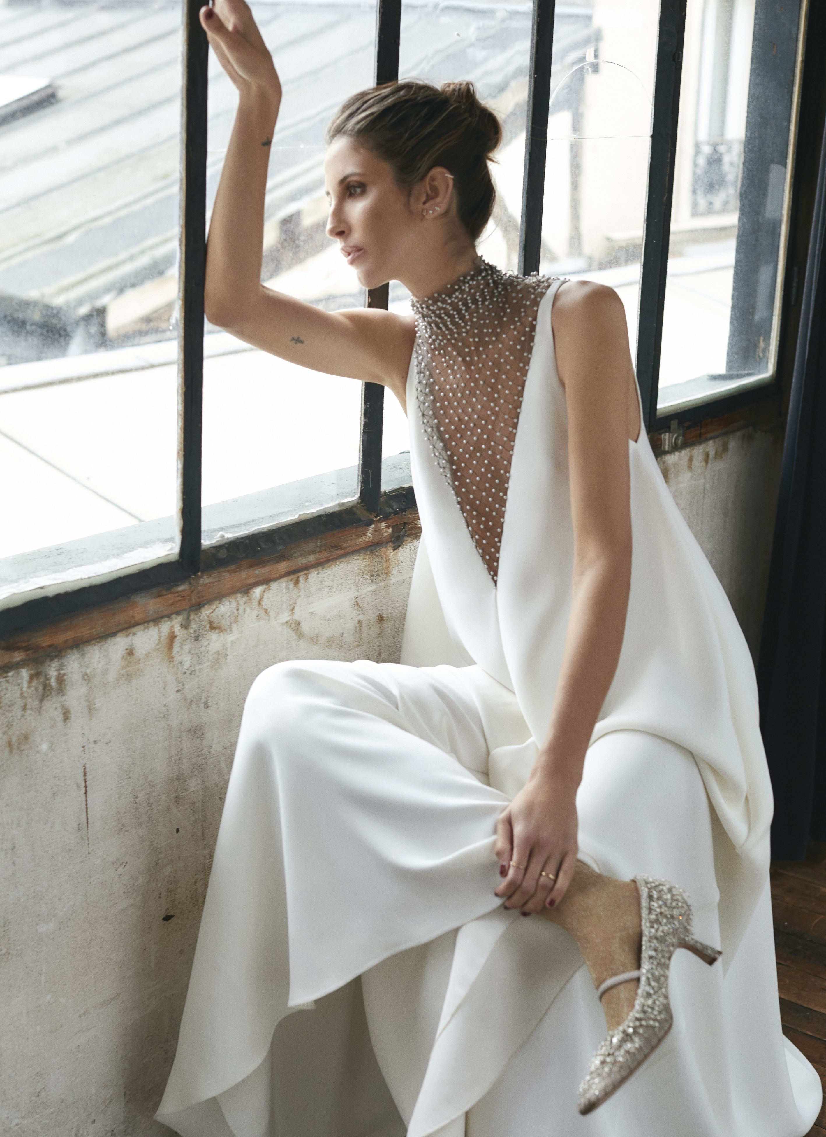 Vistiendo uno de sus diseños de alta costura. 