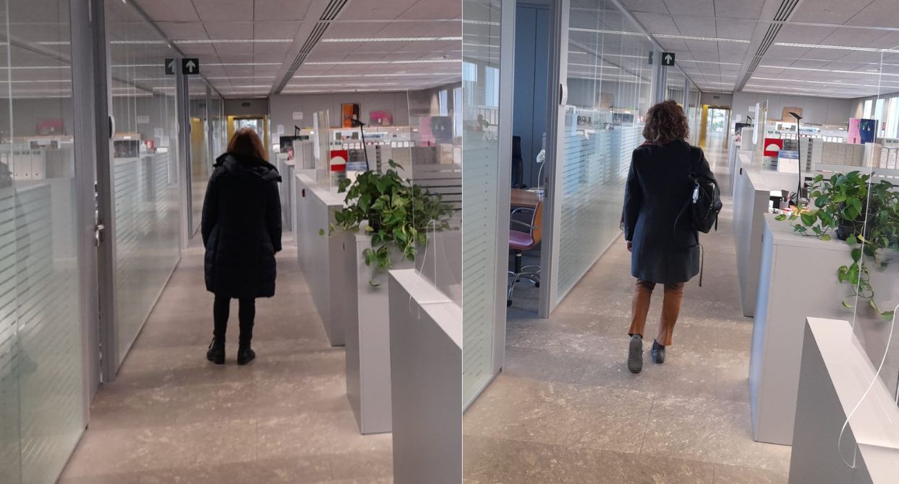 Empleadas de la consejería de Fomento trabajando con el abrigo puesto.