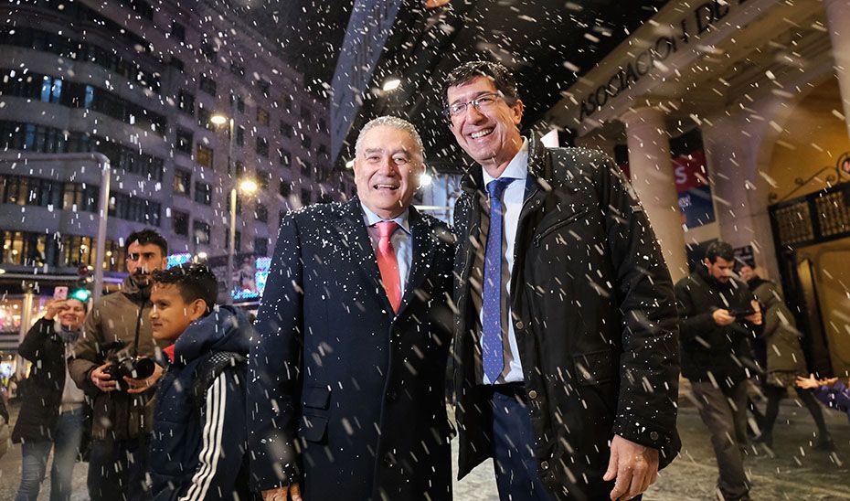 Juan Marín junto al secretario general de Turismo, Manuel Muñoz, promocionando en Madrid el destino turístico navideño andaluz.