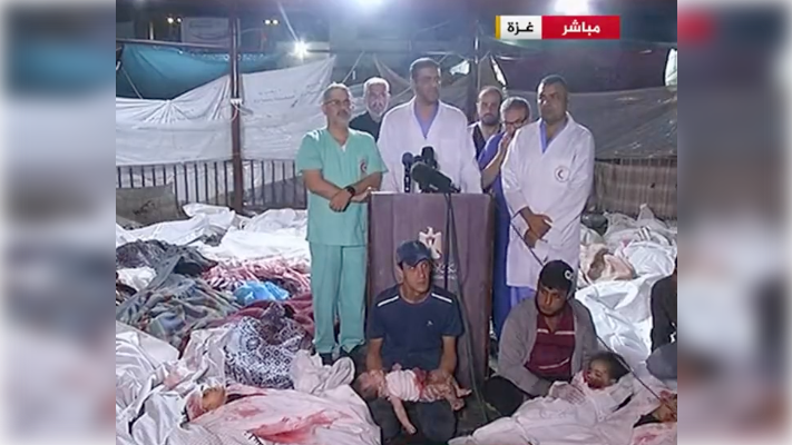 Médicos del hospital atacado, junto a decenas de cadáveres, muchos de ellos de menores.