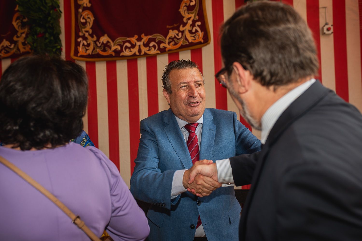 La recepción de Diputación de Sevilla en la caseta municipal, en imágenes.