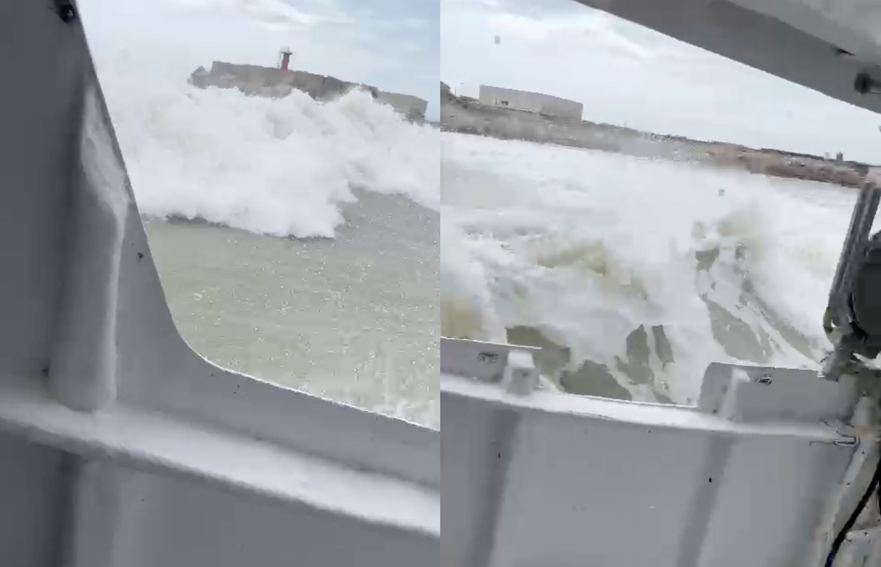 La dificultosa salida al mar de una embarcación en el puerto de Conil.