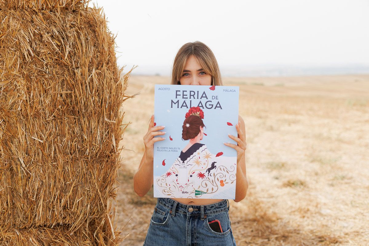 Irene Corbacho con el cartel de la feria de Málaga de El Corte Inglés.