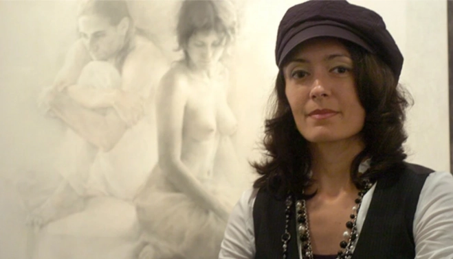 Isabel Sola Márquez ante una de sus obras. 