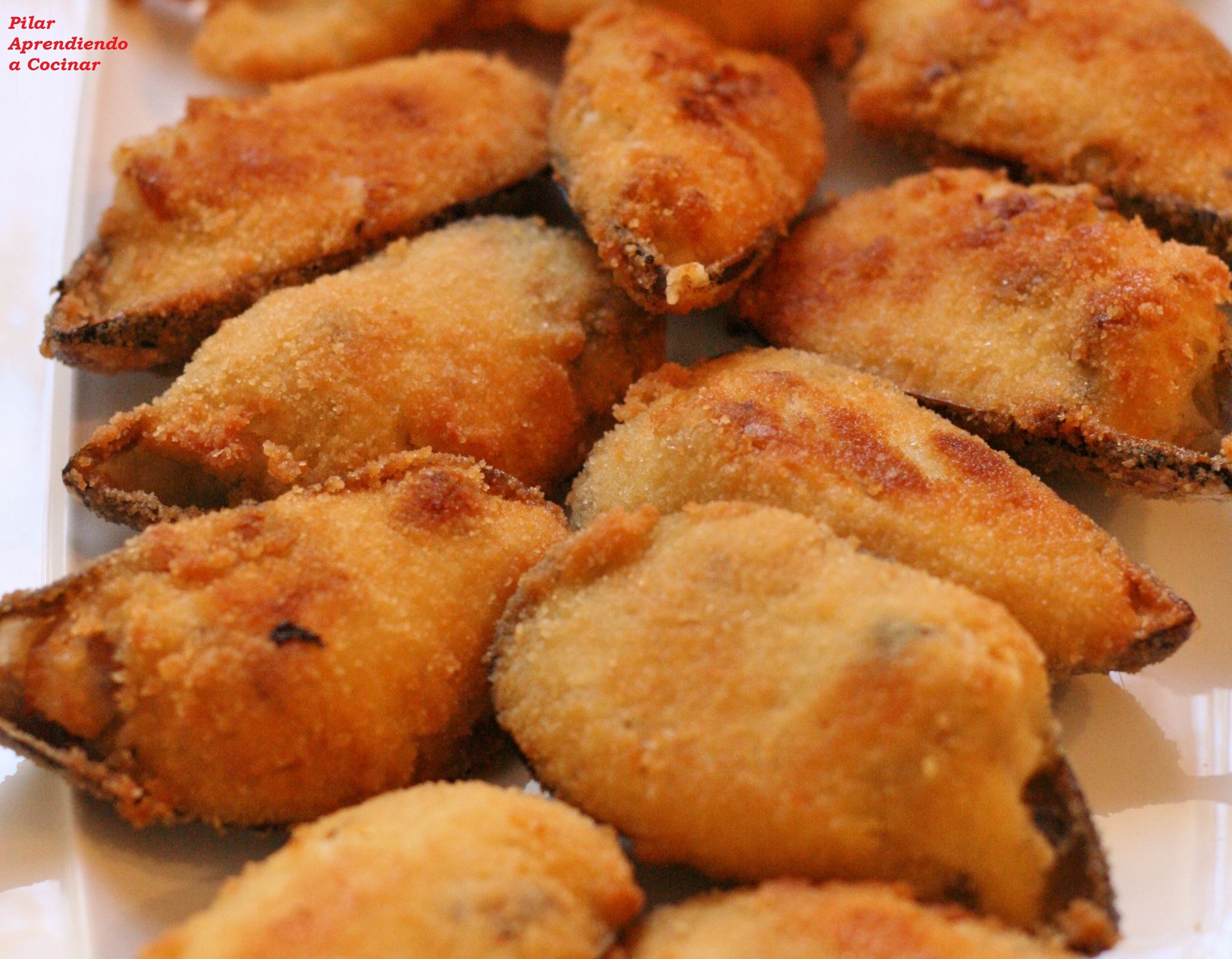 Mejillones rellenos tigres.