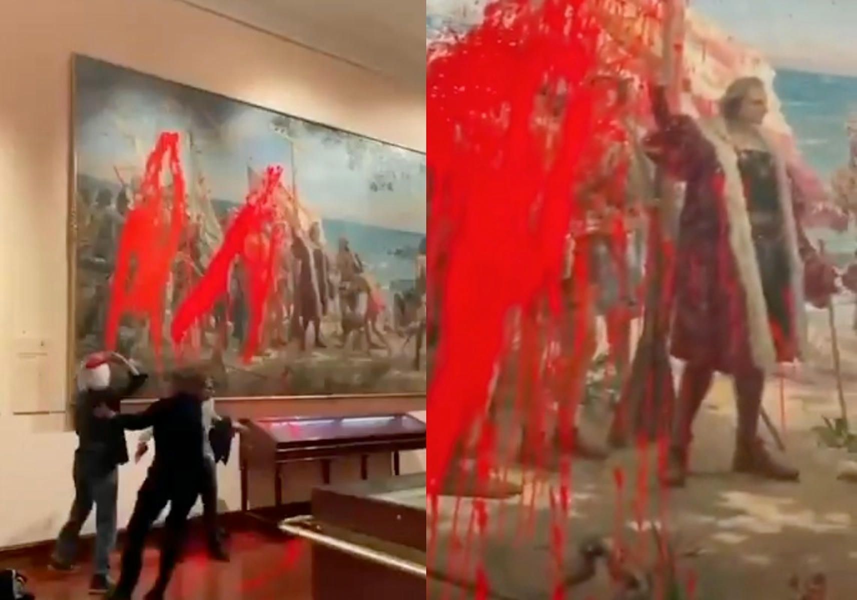 Un momento del ataque a la pintura por parte de Futuro Vegetal. Un momento del ataque a la pintura por parte de Futuro Vegetal.