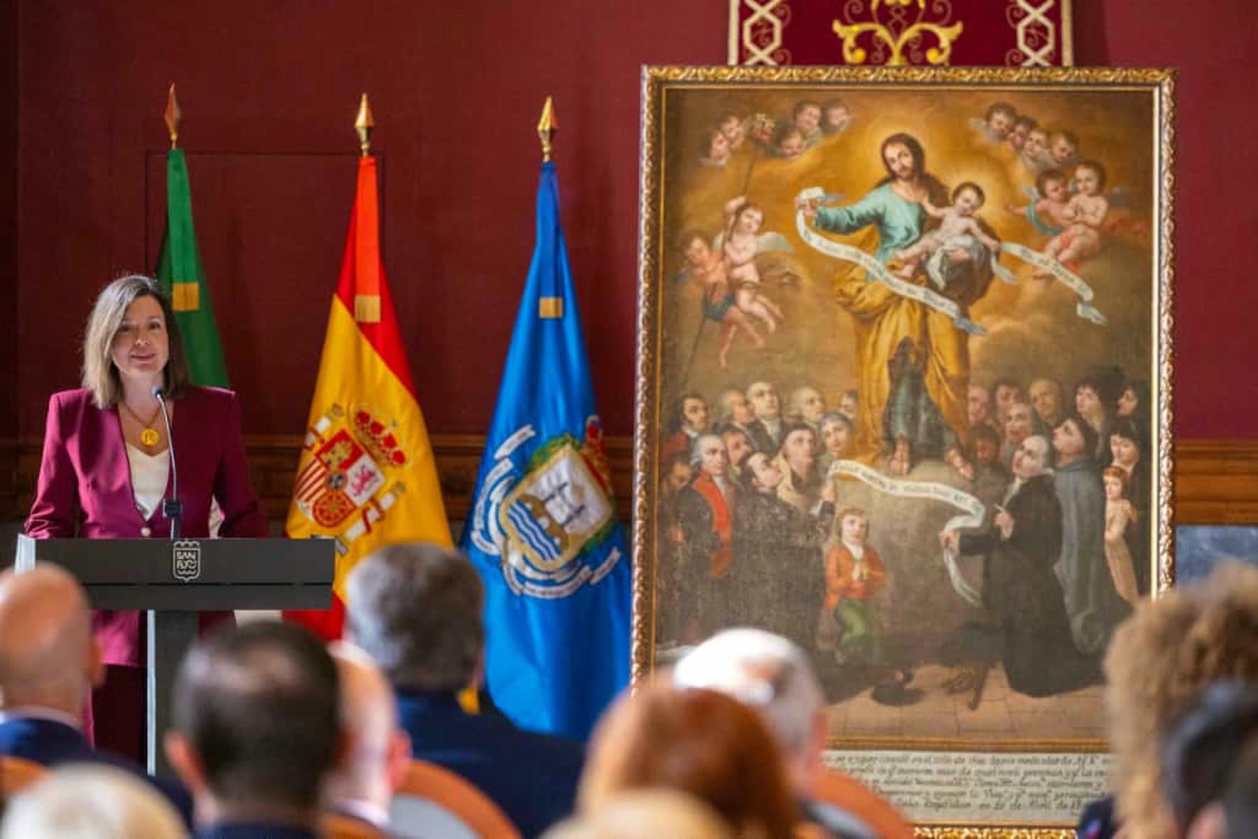 Cavada muestra la vuelta del cuadro.