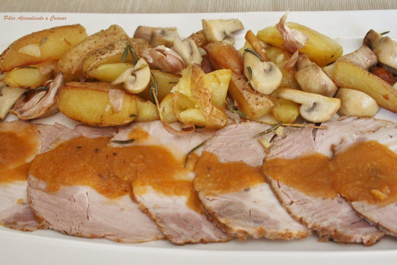 Lomo en salsa con patatas.