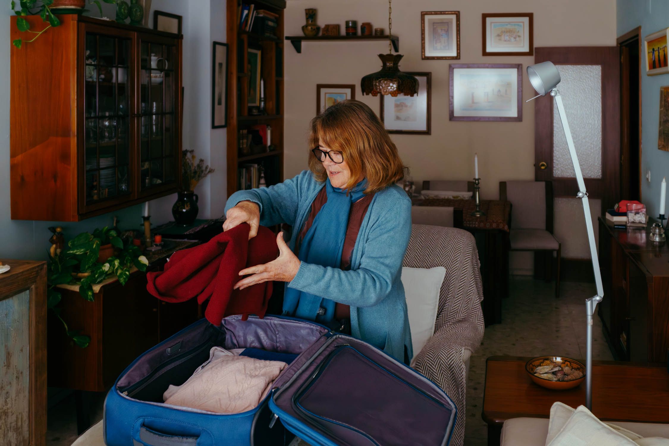 Carmen, vecina próxima a la plaza de la Asunción, es de las que hace las maletas estos días.