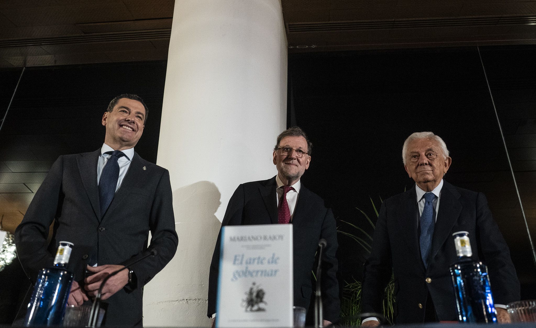 Juanma Moreno junto a Mariano Rajoy.