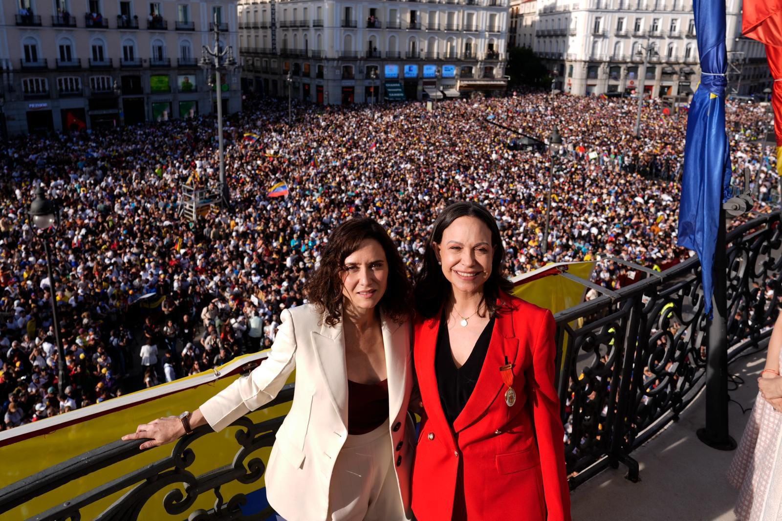 Ayuso con María Corina Machado en el acto en Madrid.