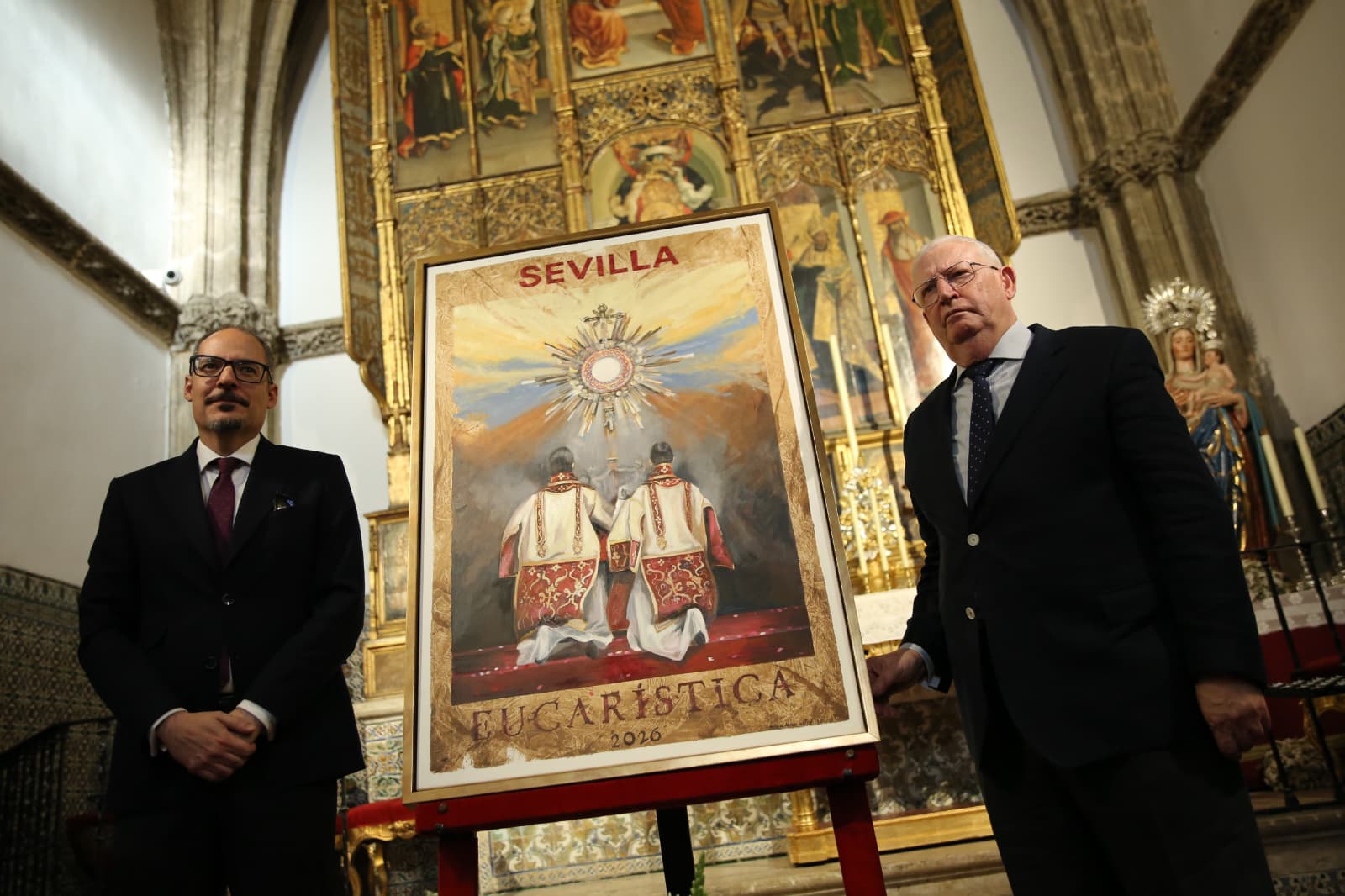 El pintor y el presidente del Consejo escoltando el cartel. 