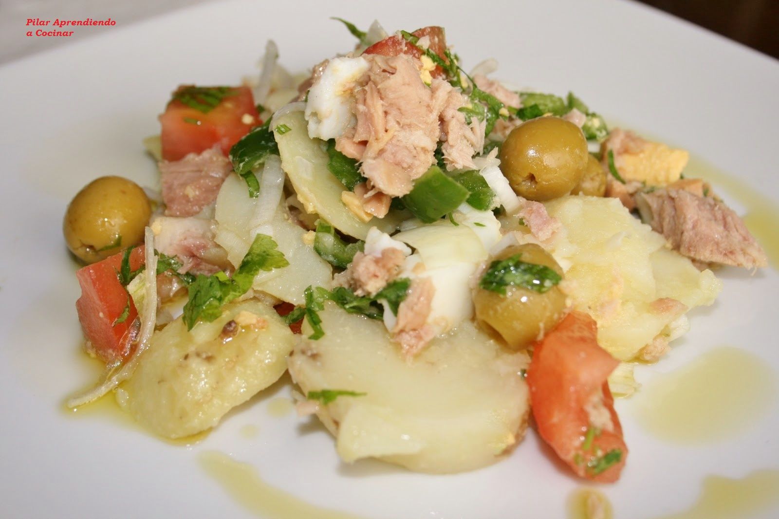 Tapa de papas aliñás.