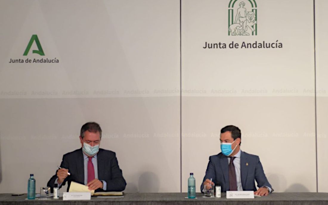 El líder del PSOE de Sevilla, Juan Espadas, en un acuerdo con el presidente de la Junta.