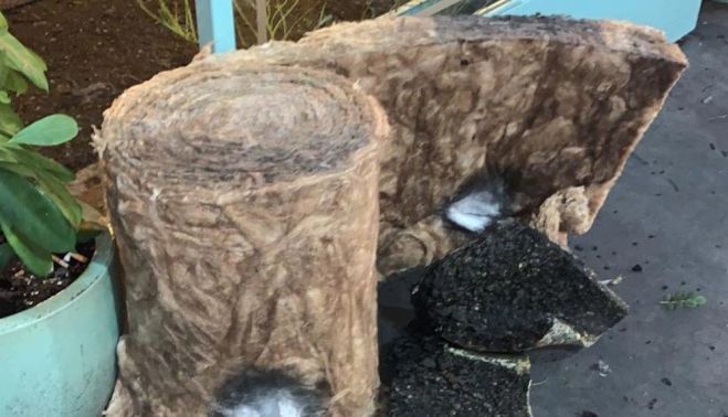 Pieza de fibra quemada.