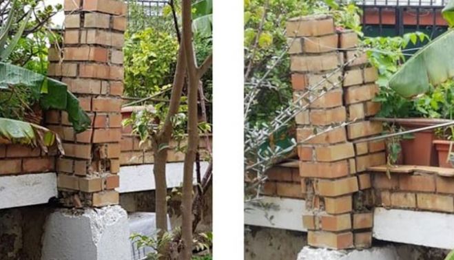 Ladrillos en mal estado a la salida de la vivienda de Encarnación.