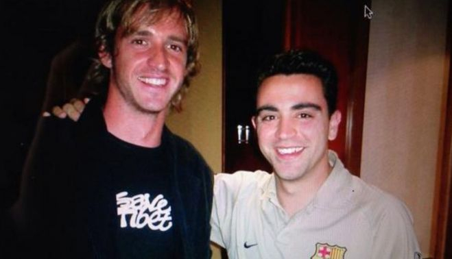 Gerard, junto a Xavi, el actual entrenador del FC Barcelona.